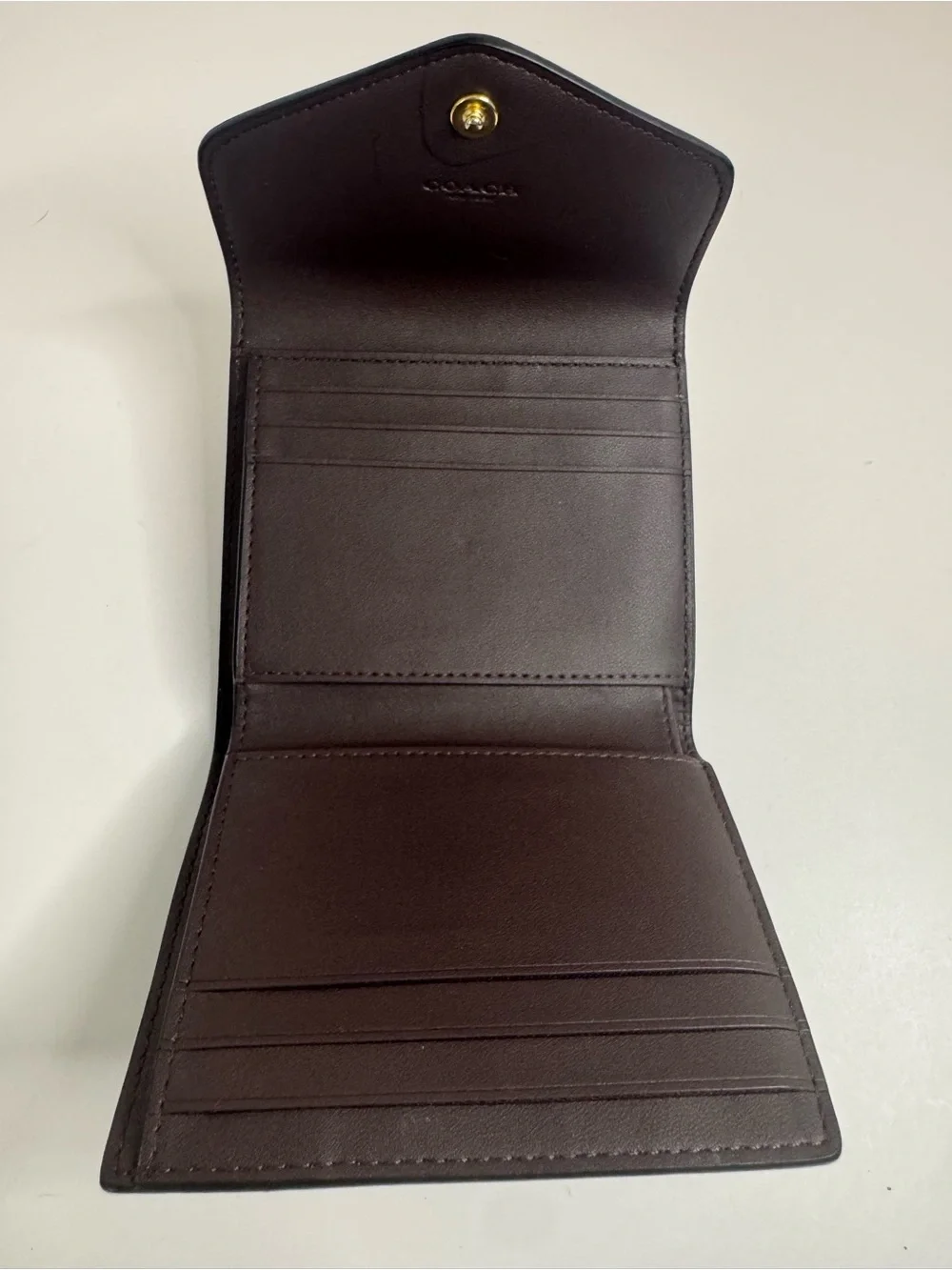 #423 Coach Wyn Crossgrain Leather Trifold Compact Wallet